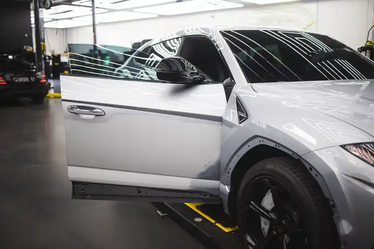 Grey car in a repair shop